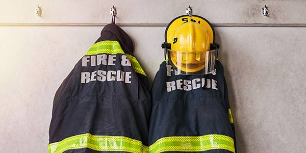 fire and rescue jackets hanging on wall